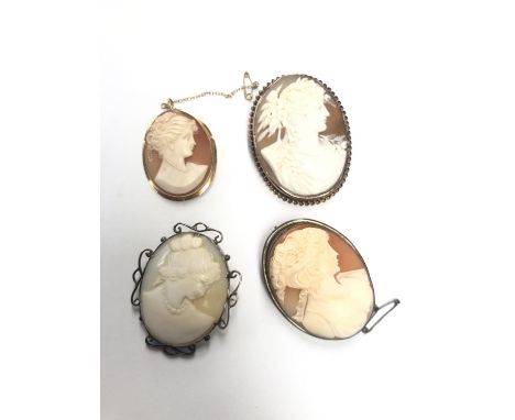 FOUR VINTAGE CARVED CAMEO BROOCHES, ALL UNMARKED 