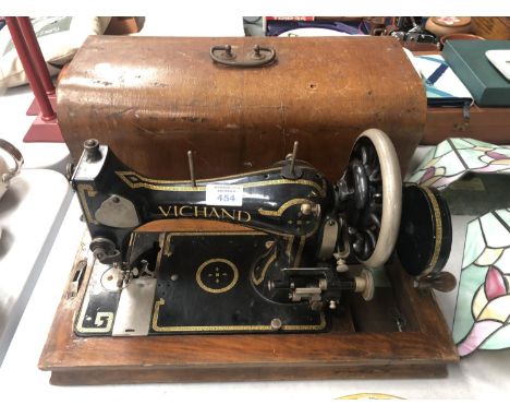 A VINTAGE ' VICHAND' SEWING MACHINE IN ORIGINAL WOODEN CASE 