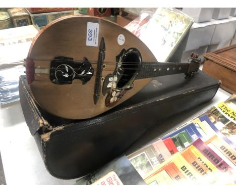 A VINTAGE CASED INLAID DOUBLE STRING MANDOLIN 