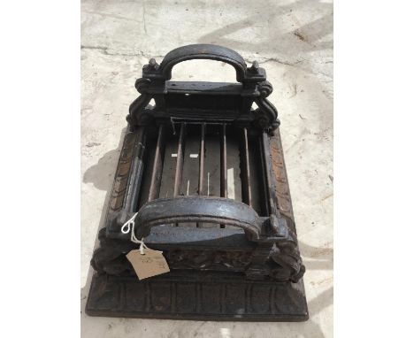 A VINTAGE HEAVY CAST METAL BOOT SCRAPER 