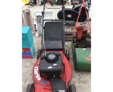 A CLARKE 22 INCH LAWN MOWER WITH A QUANTUM POWER BRIGGS AND STRATTON 5HP ENGINE 