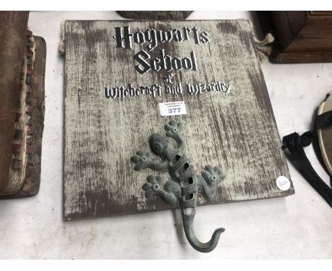 A HOGWARTS SCHOOL OF WITCH CRAFT AND WIZARDRY CLOAK HOOK 