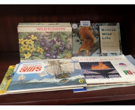 A MIXED GROUP OF VINTAGE CIGARETTE CARD ALBUMS 