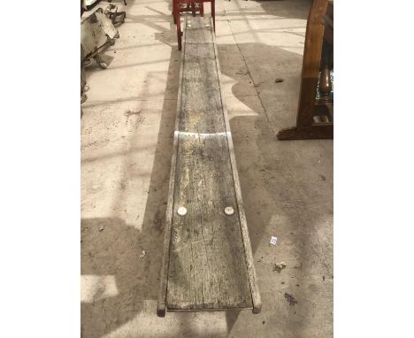A VINTAGE WOODEN SCHOOL GYM BENCH 266CM LONG 
