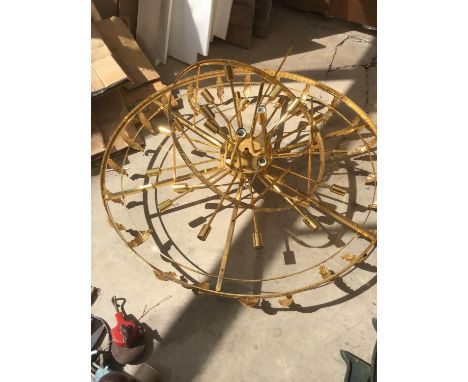 A LARGE GILT MODERN LIGHT FITTING WITH LEAF EFFECT DECORATION (IN NEED OF REPAIR) 110CM DIAMETER 