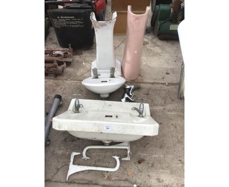 A VINTAGE ROYAL DOULTON WHITE SINK WITH BRACKETS, A SMALL SINK AND TWO PEDESTALS 