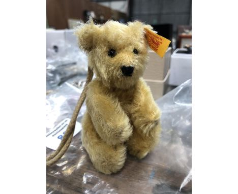 A MINIATURE 'STEIFF' TEEDY BEAR 