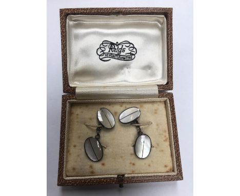 A VINTAGE BOXED PAIR OF SILVER AND MOTHER OF PEARL CUFF LINKS 