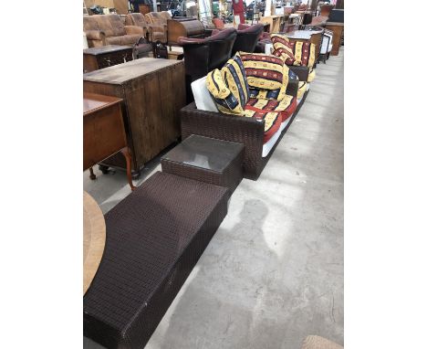 A RATTAN MODERN GARDEN SOFA SET COMPRISING TWO SEATER SOFA, TWO ARMCHAIRS AND FOOT STOOL 