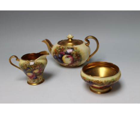 AN AYNSLEY ORCHARD GOLD THREE PIECE TEA SERVICE - SIGNED D JONES, having typical fruit decoration and high quantity of gildin