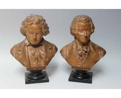 A PAIR OF TERRACOTTA BUSTS DEPICTING 'MOZART' AND 'BEETHOVEN', both raised on squared socle bases, each stamped to the revers