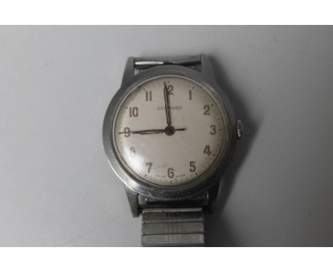 A GENTS GARRARD 1960'S STAINLESS STEEL WRIST WATCH, having champagne dial, Roman numeral hour markers, secondary outer minute