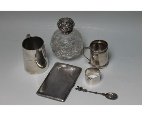 A PARCEL LOT OF HALLMARKED SILVER, consisting of two christening tankards, a large cigarette case, napkin ring, Chester marke