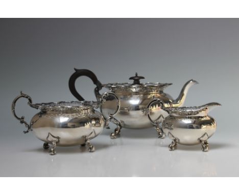 A HEAVY HALLMARKED SILVER THREE PIECE TEA SERVICE WITH PIERCED GALLERY RIM - SHEFFIELD 1916, makers mark JD over WD each piec