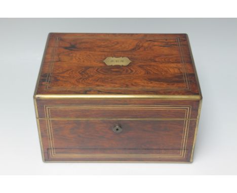 A 19TH CENTURY ROSEWOOD AND BRASS INLAID LADIES DRESSING BOX, the hinged lid with inlaid brass plaque engraved 'S R M', openi