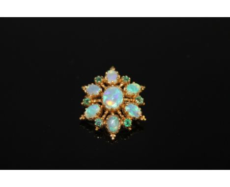 AN OPAL & EMERALD PENDANT BROOCH, set with seven opals and six emeralds, H 25 mm Buyers - for shipping pricing on this lot, v