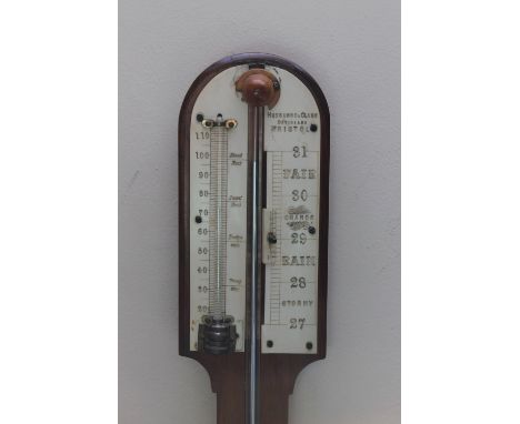 A VICTORIAN WALNUT STICK BAROMETER BY 'HUSBANDS & CLARK OF BRISTOL', with an engraved ivorine register, H 90 cm Buyers - for 