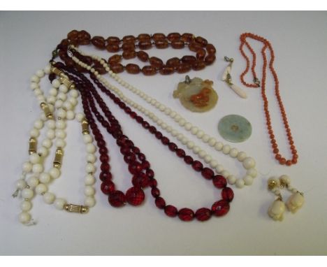 A SELECTION OF CORAL AND JADE JEWELLERY ETC, to include earrings, pendants and a single strand hand-knotted coral bead neckla