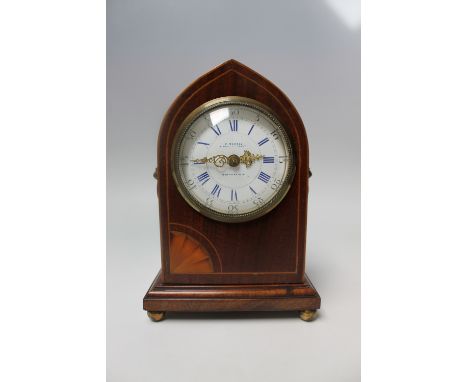 AN EDWARDIAN INLAID MAHOGANY MITRE TOP MANTEL CLOCK, signed 'C. Sewell, 4 Davies Street, Berkeley Sq., W', white enamel dial,