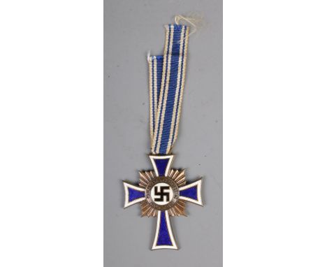German WW2 Cross Of Honour Of The German Mother Bronze with ribbon. This award was instituted on 16 December 1938. The idea w