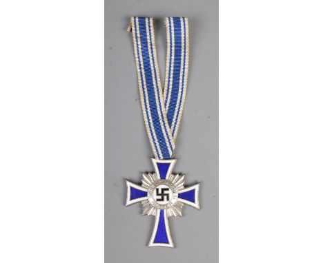 German WW2 Cross Of Honour Of The German Mother Silver with ribbon. This award was instituted on 16 December 1938. The idea w
