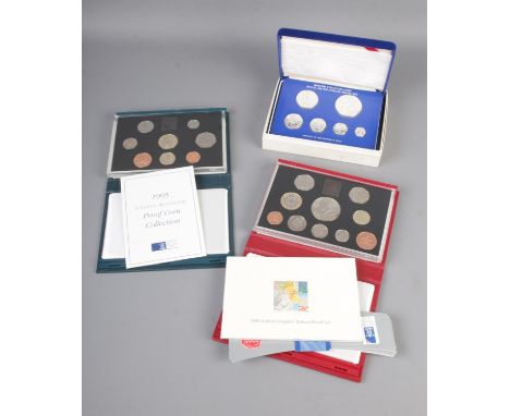 Three cased proof coin collections including 2005 Craftsmanship in an age of technology, 1998 deluxe proof set alive with his