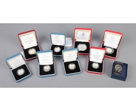 A large quantity of silver proof coins including 1998 two pound coin, 1997 fifty pence coin, 1998 piedfort one pound coin, 20