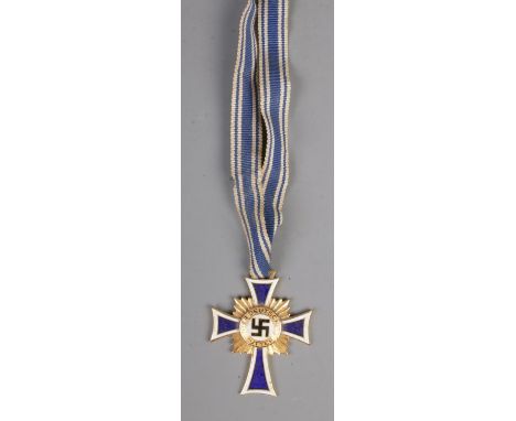 German WW2 Cross Of Honour Of The German Mother Gold with ribbon. This award was instituted on 16 December 1938. The idea was