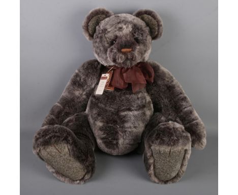 A large Charlie Bears Limited Edition jointed teddy bear: Hugsley (CB171804) designed by Isabelle Lee with bow and original s