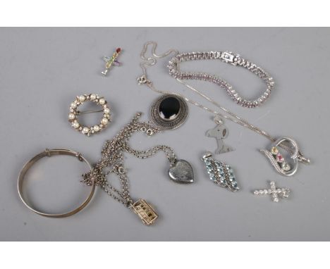 A collection of assorted silver jewellery including bangle, love heart pendant, necklaces with pendants etc  