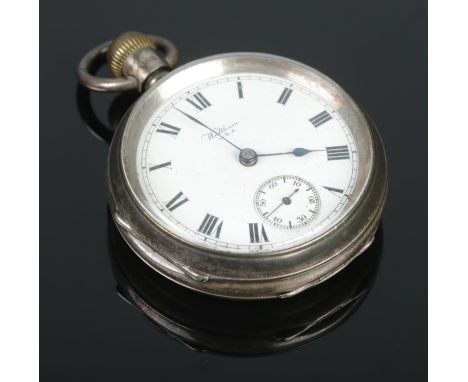 A silver American Waltham Watch Co. pocket watch, with Roman Numeral face stamped 'Waltham U.S.A' and subsidiary second dial.