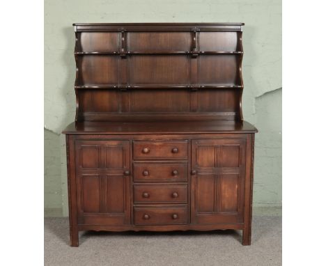 An Ercol 'Old Colonial' dresser. Approx. dimensions 170cm x 147cm x 52cm.  