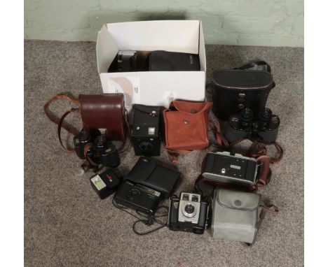 A collection of assorted vintage cameras and binoculars to include Carl Zeiss Jena Jenoptem 8x30W, G.B Kershaw 110, The Butto