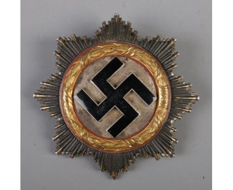 A WWII Second World War Third Reich Nazi German 'Deutsches Kruez' ( The German Cross ) medal.The War Order of the German Cros