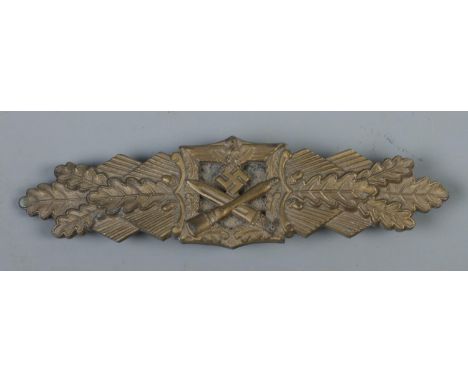German Third Reich WW2 Army / Waffen SS Close Combat Clasp in bronze. The reverse bears in relief F.E.C. W.E. PEEKHAUS BERLIN