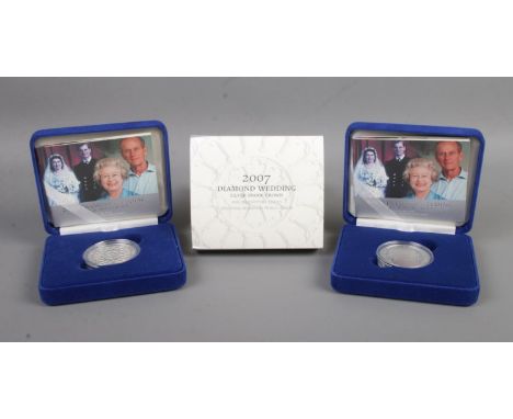 The Royal Mint; Two boxed 2007 Diamond Wedding silver proof crowns. Limited Edition of 35,000, both with leaflets. Weight of 