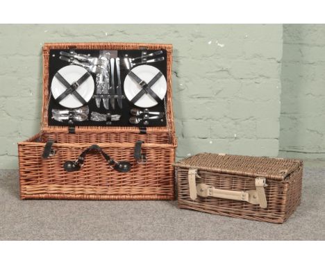 An Optima four place wicker picnic hamper and contents, together with a smaller wicker picnic basket.  
