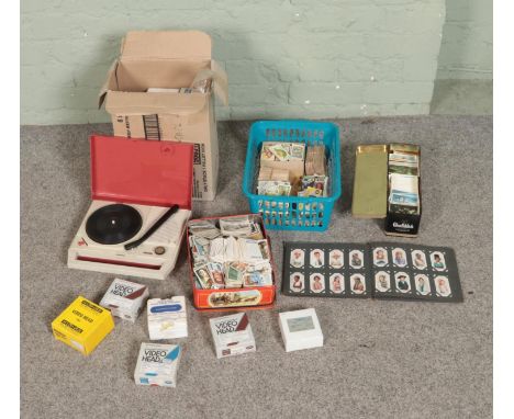 A collection of miscellaneous to include box of assorted Video Heads, PHD-105 toy record player and good collection of cigare