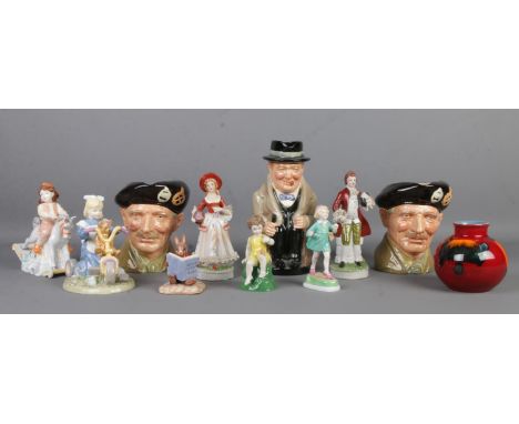 A collection of named ceramics and figures, to include two Royal Doulton D6202 Monty jug, Winton Churchill jug, Poole Vase an
