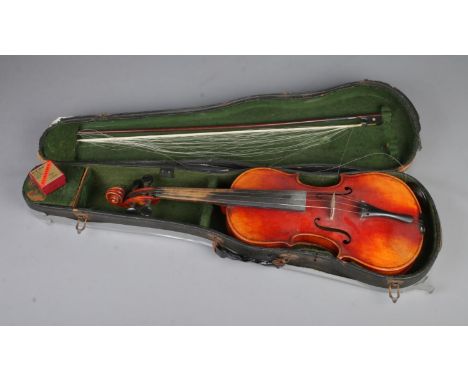 An antique two piece back Violin bearing label reading "Nicolaus Amatus Fecit in Cremona 1633" to inside. Includes original h