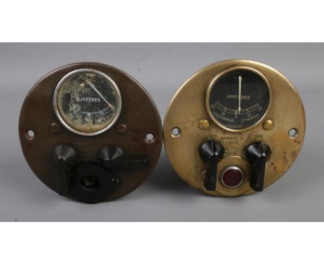 Two Austin 7 ammeter and switch panels produced by Joseph Lucas.  One example is missing light and back cover.