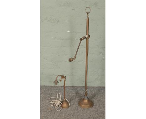 Two brass lamps to include rise and fall floor lamp. Approx. height of floor lamp 101cm.  Floor lamp is in need of repair and