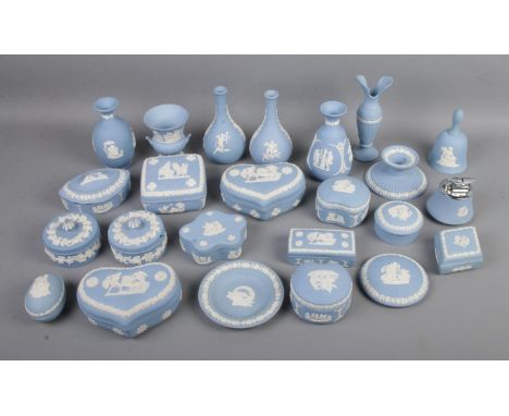 A collection of Wedgwood blue Jasperware to include trinket boxes, candlestick, posy vases, etc.  