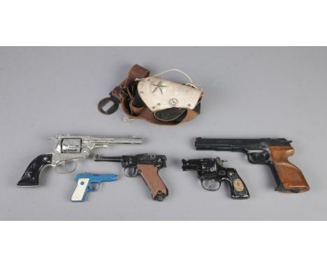 A collection of vintage toy guns, including Lone Star Cheyenne, Sleuth and Dragnet.  CANNOT POST.