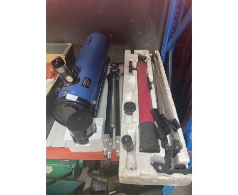 A Tasco telescope in a box, camera tripod and a Skywatcher telescope (AF) 