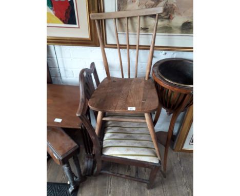 An Ercol blonde elm chair and a Georgian mahogany chair. 