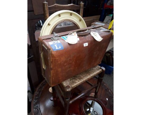 A ladder back chair, a vintage case and a 1950's bevelled mirror. 