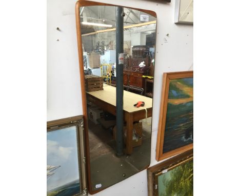 A retro teak mirror. 