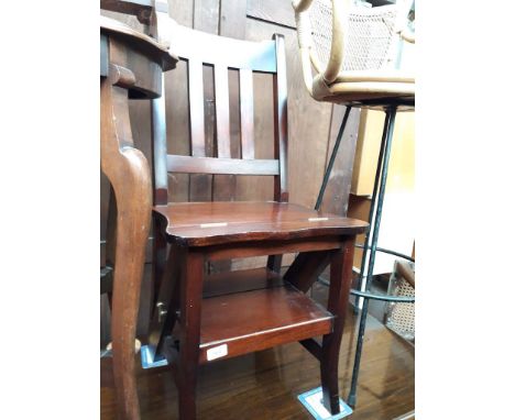 A folding step chair. 