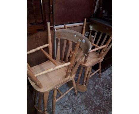 A set of four light beech chairs. 